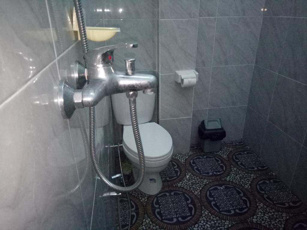 Aris Homestay And Warung Made Мундук Экстерьер фото