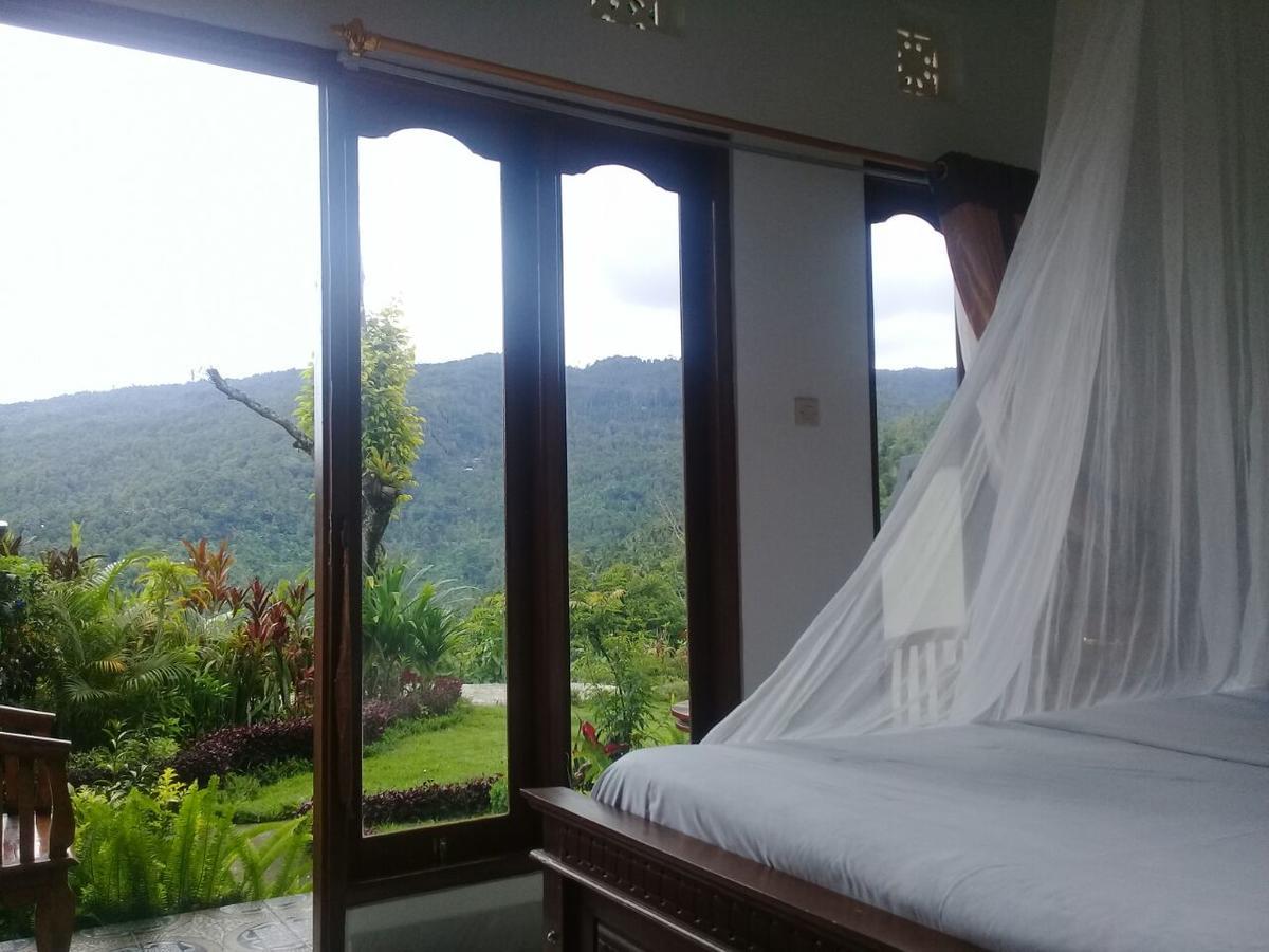 Aris Homestay And Warung Made Мундук Экстерьер фото